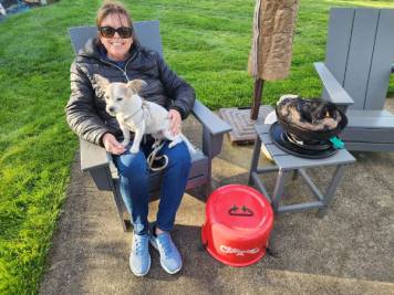 Susan Sims camping at the Vintages Trailor resort - enjoying smores