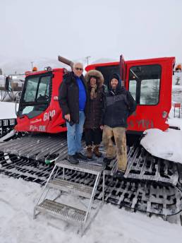 Greg and Susan Sims with the snowcat driver getting ready to take the trip up to the yurt