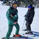 Susan Sims with the ski instructor, Michael