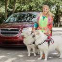 Jo-Anna Hehir with her two Great Pyrenees deliver packages for Amazon Flex