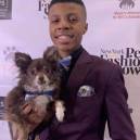 Darius Brown showcasing his doggie bow ties