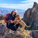 Nikki Delventhal hiking with her dog Camper 