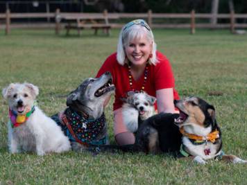 Shannon Spring, Animal Communicator, with four rescue dogs